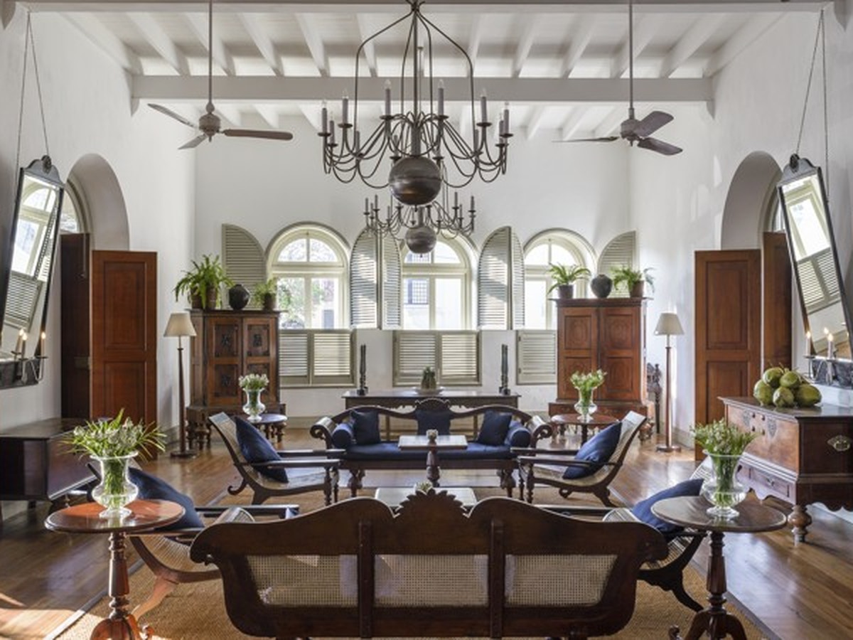 Amangalla heritage hotel interior in Galle Fort Sri Lanka with colonial architecture, high ceilings, antique furniture and elegant lounge setting