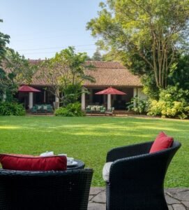 Garden and colonial villa at The Wallawwa boutique hotel in Sri Lanka